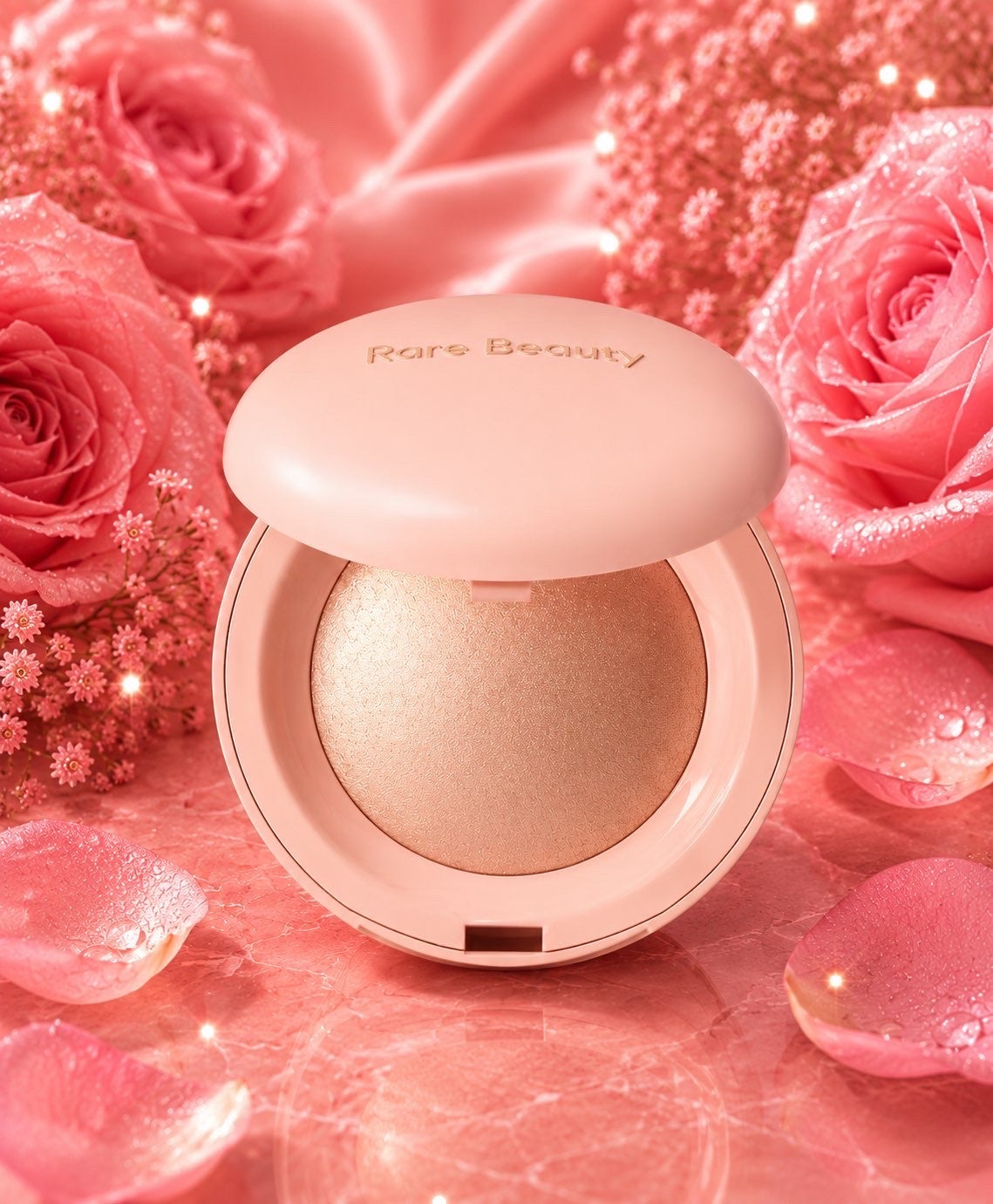 RARE BEAUTY Poudre illuminatrice - Exhilerate